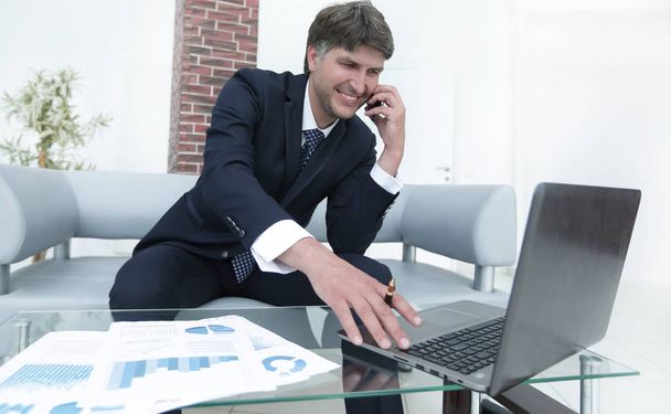 Close-up of a successful businessman with a smartphone - Fotó, kép