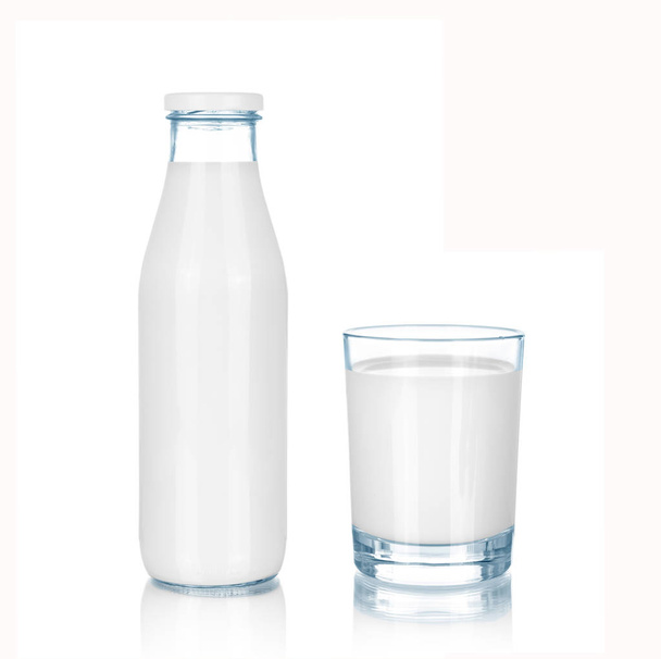 A bottle and glass of milk, isolated on white background  - Fotografie, Obrázek