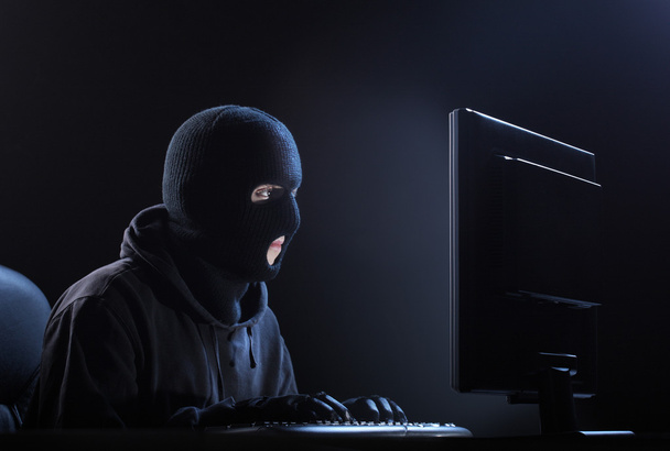 Hacker stealing data - Фото, изображение