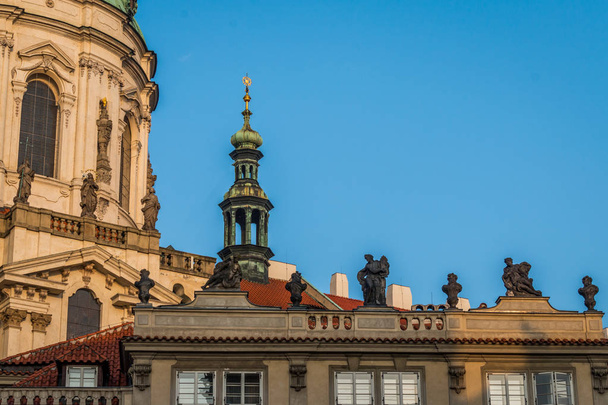 Statues of St. Nicolas Church in Prague - Zdjęcie, obraz