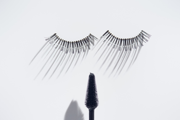 Set of eyelashes with brush on white background - Zdjęcie, obraz