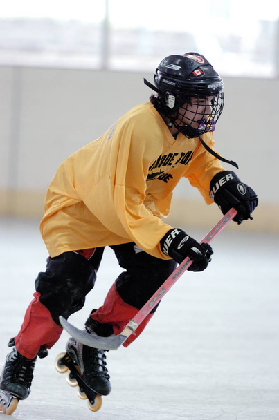 Youth Roller Hockey Game during game action - Foto, Imagen