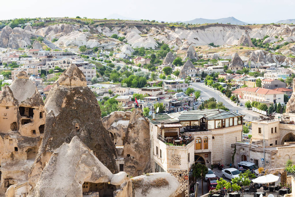 GOREME, TURKEY - MAY 5, 2018: residential block in Goreme town in spring. Goreme is town in Cappadocia, in the Nevsehir Province in Central Anatolia of Turkey - Photo, Image