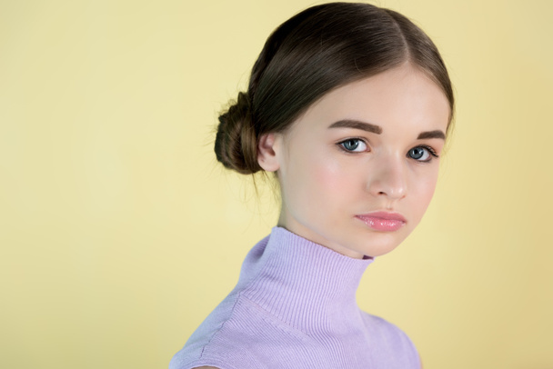 portrait of beautiful youth girl, isolated on yellow - Fotoğraf, Görsel