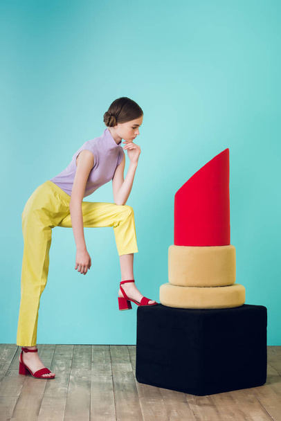 elegant teen girl posing with big red lipstick for fashion shoot - Φωτογραφία, εικόνα