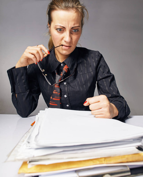 business woman at work. She is very tired - Фото, изображение
