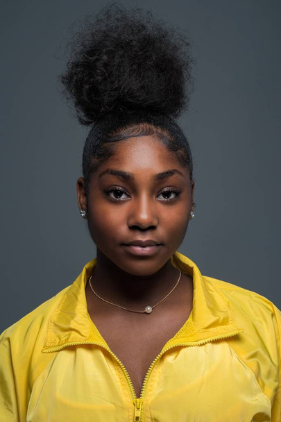 African American teen girl modeling in a portrait session - Foto, imagen