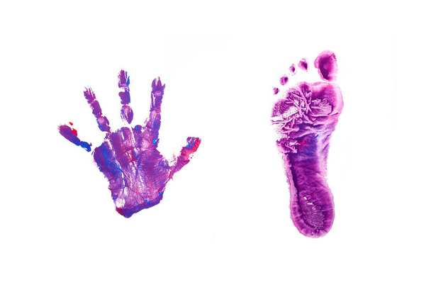 Empreintes petit pied de bébé et main
. - Photo, image