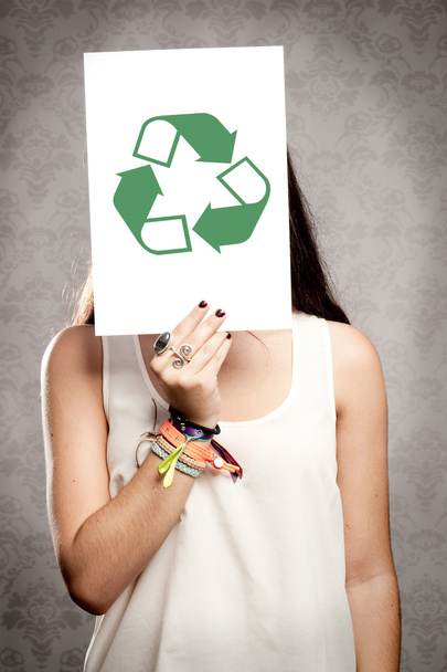 girl holding a recycling symbol - Фото, изображение