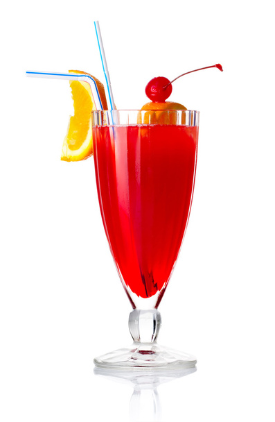 Red alcohol cocktail with orange slice and umbrella isolated - Photo, Image