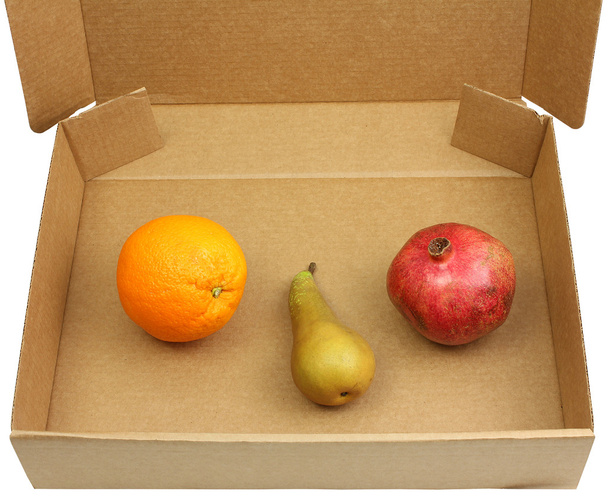 Granatapfel, Birne und Orange in einer Schachtel - Foto, Bild