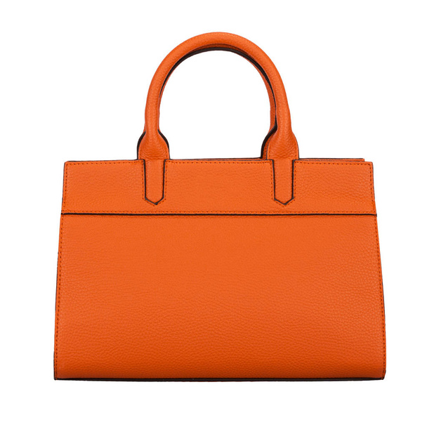 Bolso de mano de mujer clásico naranja claro de moda de cuero sólido con rayas en relieve vista frontal aislada sobre fondo blanco
 - Foto, imagen
