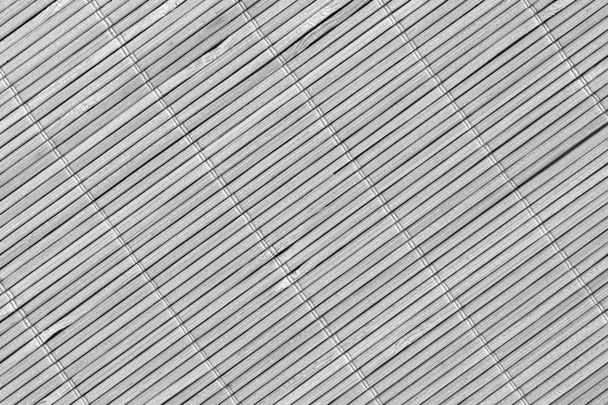 Esteira cinzenta do lugar do bambu Textura grossa entrelaçada ripada rústica
 - Foto, Imagem