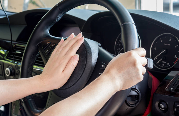 Hand of driver on steering - Foto, Imagen