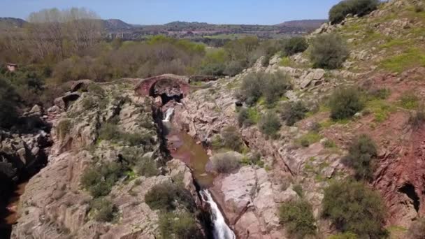 Roman Bridge of Vadollano, which is part of the route of the route Augusta, enclave of special scenic and historical interest, because to the beauty of the route of the Guarrizas River, Linares, Jaen Province, Spain - Footage, Video