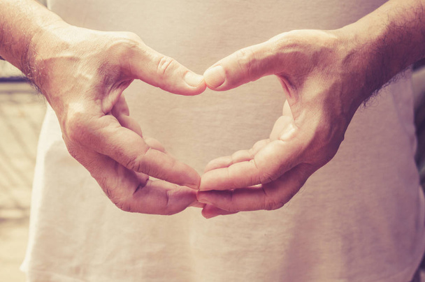 Hands in shape of heart - Φωτογραφία, εικόνα