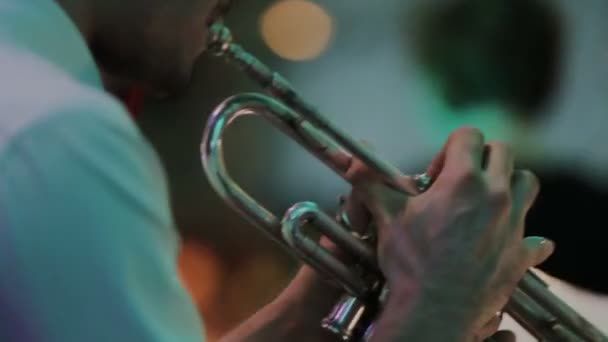 Musicians with trumpet, guitar and sax of band are playing music at musical bar - Footage, Video