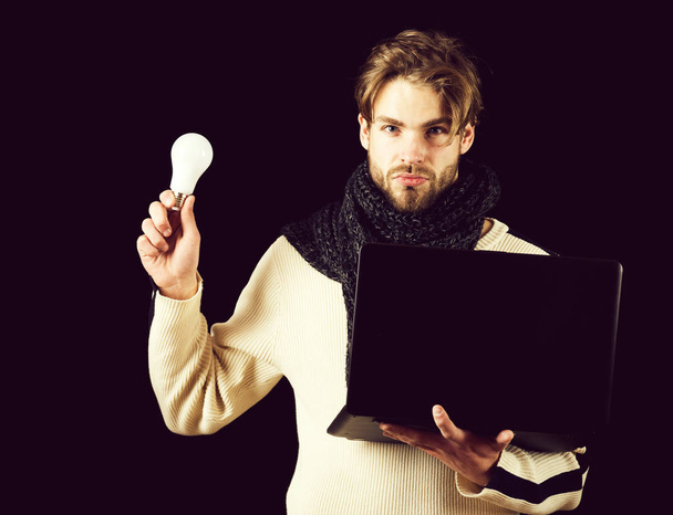bearded guy with laptop and lamp - Foto, afbeelding