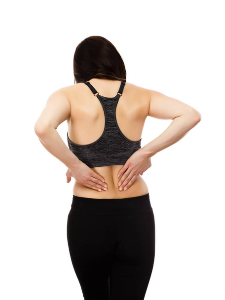 Woman massaging back pain - Fotografie, Obrázek