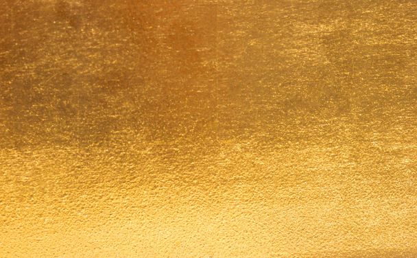Shiny yellow leaf gold foil texture background - Foto, Bild