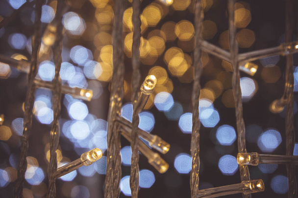 お祭りの装飾的なライトの小さい Led の光で光ボケ夜 - 写真・画像