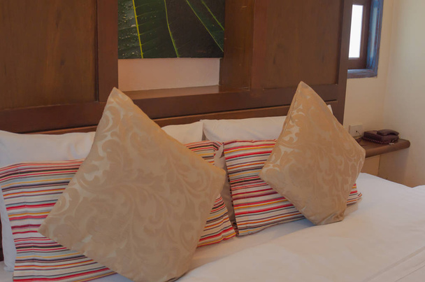 Beds and pillows in modern bedroom. - Fotó, kép