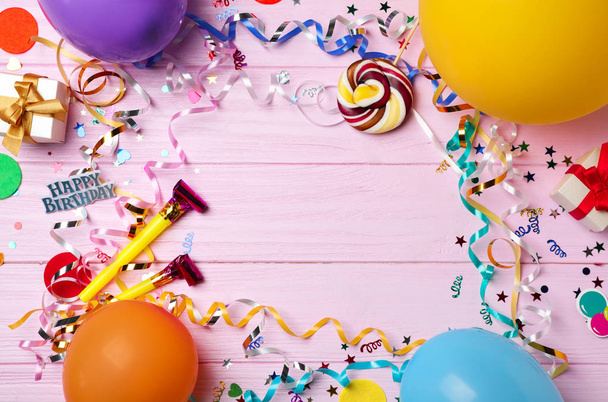 Flat lay composition with birthday party items on wooden background - Φωτογραφία, εικόνα