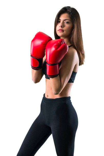 Giovane ragazza sportiva con guanti da boxe
 - Foto, immagini