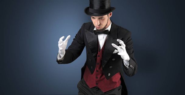 Magician holds something invisible  - Valokuva, kuva