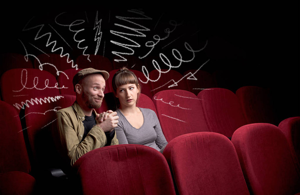 Cute couple in cinema watching movie  - Foto, Imagen