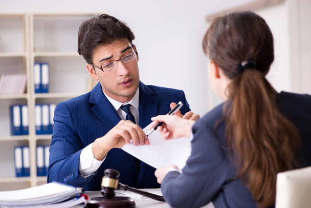 Lawyer talking to his client in office - Foto, Imagem