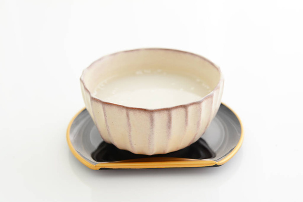 Amazake. It's a sweet drink made from fermented rice. - Photo, Image