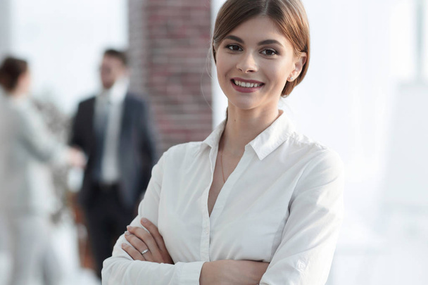 portrait of young business woman on the background of the office - Фото, изображение
