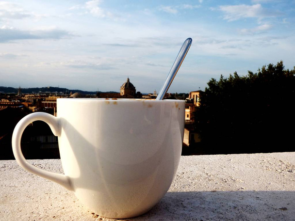 Cup of coffee on a roof of Rome - Photo, Image