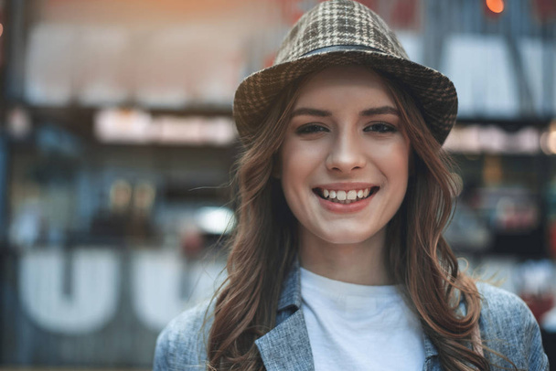 Grinning young lady in trendy hat - Fotografie, Obrázek