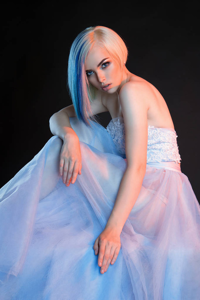beautiful bride woman with blue hair.Girl with colored hair and make-up.vail and wedding dress - Photo, Image