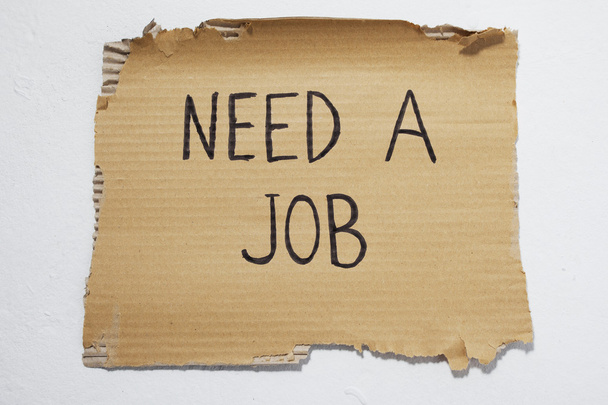 Cardboard that says need a job - Foto, Bild