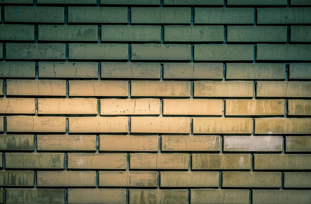 Brick wall texture of yellow stone blocks closeup abstract background with copy space - Фото, изображение