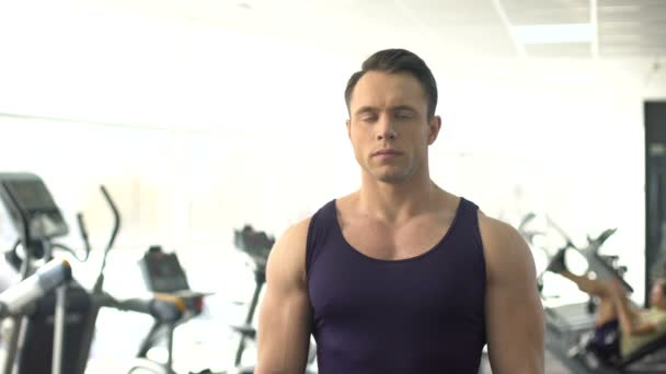 Handsome muscular man posing, gym service, personal trainer, sport motivation - 映像、動画