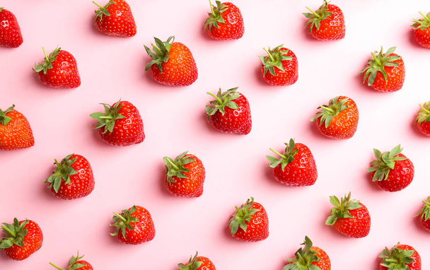 Flat lay composition with with tasty ripe strawberries on color background - Fotó, kép