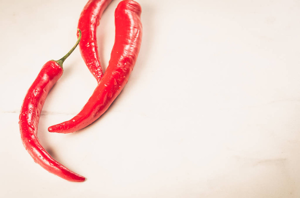 composition of red chili pepper/composition of red chili pepper on a white background. Copy space - 写真・画像