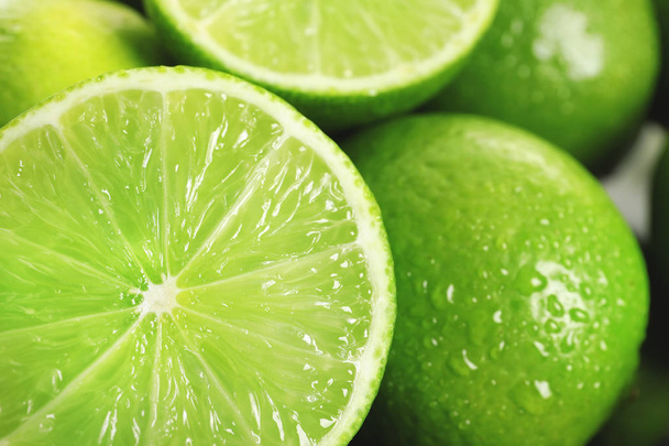Fresh ripe green limes as background - Photo, Image