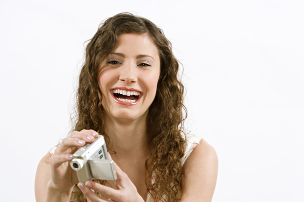 teenage girl using a small video camera - Photo, Image