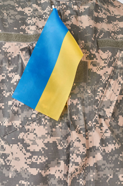 Ukrainian flag on military uniform. - Φωτογραφία, εικόνα