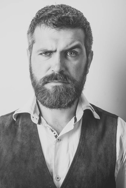 Face fashion boy or Man in your web site. Man face portrait in your advertisnent. Man with long beard and mustache on serious face. - Фото, изображение