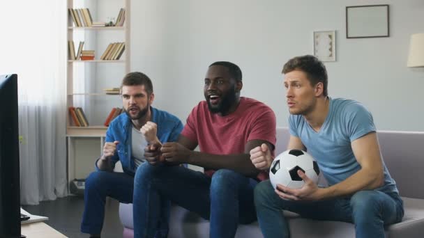 Men watching football, high expectation of goal, burst out roaring after scored - Footage, Video