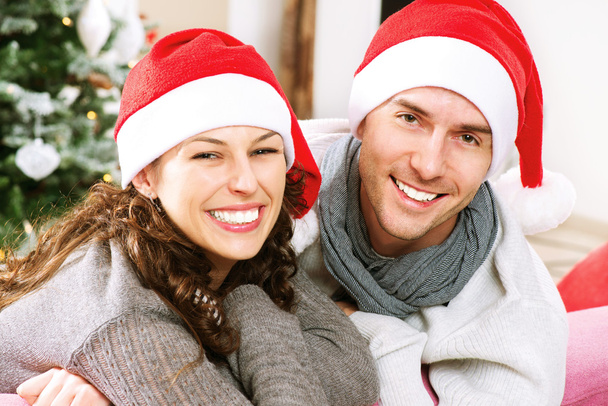 Christmas Couple wearing Santa's Hat - Foto, immagini
