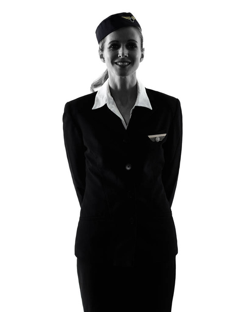Stewardess cabin crew woman standing isolated silhouette - Фото, изображение