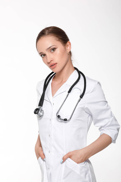 woman doctor with white coat - Фото, зображення