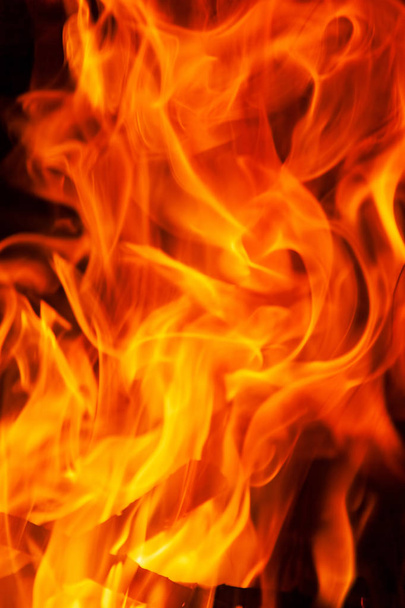 Фотография фактуры пламени, огненного фона, горящего крупного плана, пламени - Фото, изображение